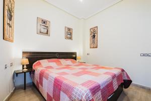 A bed or beds in a room at ALEGRIA ID103
