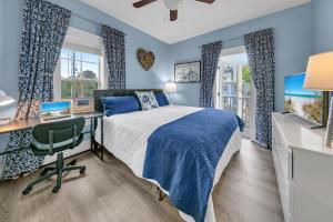 En eller flere senge i et værelse på Four Fish Bungalow 155