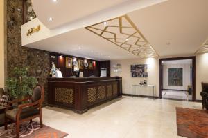 a lobby with a reception desk in a building at Quiet Hotel Al Shatee in Jeddah
