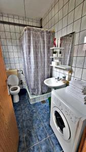 Ванна кімната в Sarajevo Apartment Aila