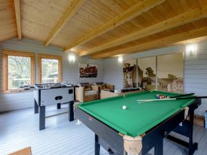 a room with a pool table in a house at 2 Bed in Isle of Purbeck DC118 in Arne