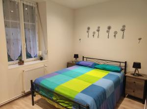 Postel nebo postele na pokoji v ubytování Chez Dori Chambre privée