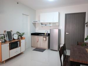 Kuchyň nebo kuchyňský kout v ubytování Olvera Residences
