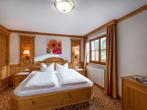 Łóżko lub łóżka w pokoju w obiekcie Appartements Haflingerhof