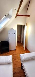 Postel nebo postele na pokoji v ubytování Gite 2 Le Loft du ChAtÔ