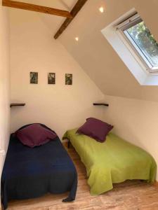 Postel nebo postele na pokoji v ubytování Gite 2 Le Loft du ChAtÔ