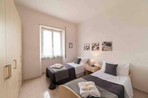 Ένα ή περισσότερα κρεβάτια σε δωμάτιο στο Casa Sofia