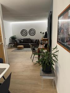 a living room with a couch and a table at Casa D'Angelo in Vicenza