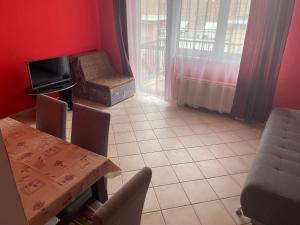 Posedenie v ubytovaní Jola Apartman