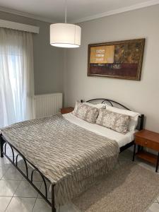 En eller flere senger på et rom på Baku Apartments