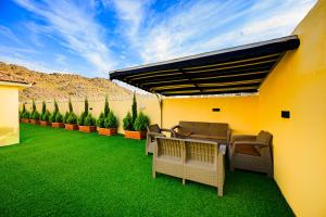 Patio nebo venkovní prostory v ubytování Zaman Homeland Hotel