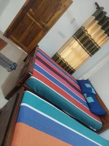 Letto o letti in una camera di Dark waves villa