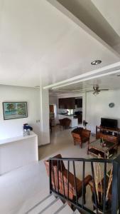 a living room with a couch and a table at Ricardo Valley Inn in Coron
