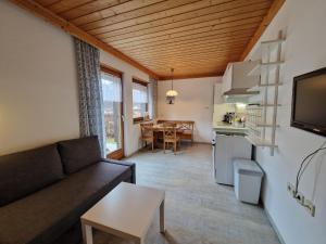 Kuchyň nebo kuchyňský kout v ubytování Profelt`s Apartments Uttendorf - Steinbock Lodges
