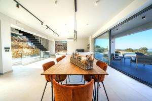 O zonă de relaxare la In Vivo Villa - Breathtaking View -90sqm Heated Infinity Pool