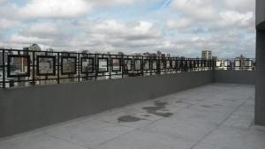 a balcony with a view of a city at Apartamento Central Curitiba in Curitiba