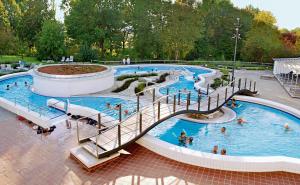 a group of pools with people in them at Gaestehaus Hofer in Bad Birnbach
