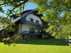 a view of the house from the yard at Apartment Židana marela - Attic with a View in Kranjska Gora