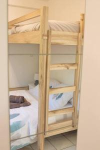 Letto o letti in una camera di T3 résidence les ramiers (anse a l'âne)