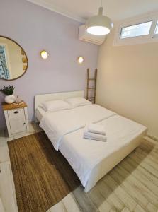 Posteľ alebo postele v izbe v ubytovaní Villa Ulyana Kriaritsi - Athos Sea View & Spa