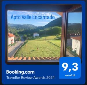 a window with a view of a field of grass at Apto Valle Encantado, vistas preciosas en urbanización con piscina in Gibaja
