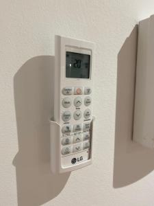 a remote control hanging on a wall at LAR DE SEFA in Redondela