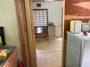 Eldhús eða eldhúskrókur á 山の宿大樽風呂のたけのこ