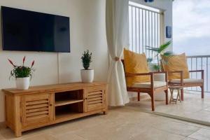 TV tai viihdekeskus majoituspaikassa Studio vue Mer