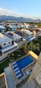 an aerial view of a resort with a swimming pool at Option Full Service Residence in Rio de Janeiro