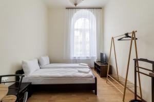 Postel nebo postele na pokoji v ubytování Soborniy Hostel