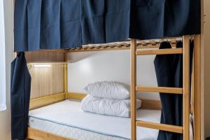 Postel nebo postele na pokoji v ubytování Soborniy Hostel