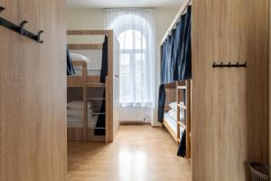 Postel nebo postele na pokoji v ubytování Soborniy Hostel