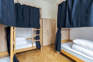 Postel nebo postele na pokoji v ubytování Soborniy Hostel