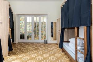 Postel nebo postele na pokoji v ubytování Soborniy Hostel