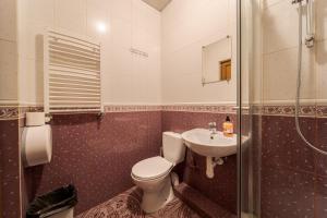 Koupelna v ubytování Soborniy Hostel
