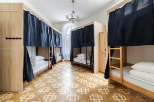 Postel nebo postele na pokoji v ubytování Soborniy Hostel