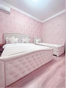 Voodi või voodid majutusasutuse Armenia Hotel toas