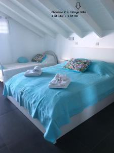 Ένα ή περισσότερα κρεβάτια σε δωμάτιο στο Villa Bacaly +17 φωτογραφίες