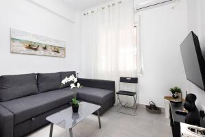 A seating area at A modern apartment in the heart of Athens