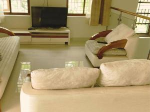 Predel za sedenje v nastanitvi Anjilickal house, Entire private luxury villa