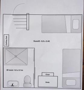 a floor plan of a small room with a bathroom at Hotel 50 in Bournemouth