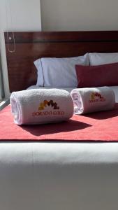 Postel nebo postele na pokoji v ubytování Hotel Dorado Gold