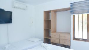 Postel nebo postele na pokoji v ubytování Cabaña La Pereztroica 3
