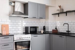 Η κουζίνα ή μικρή κουζίνα στο The Brewer apartments by Daniel&Jacob's