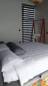 Una cama o camas en una habitación de Casas Plamont