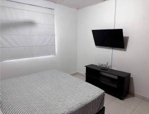 TV a/nebo společenská místnost v ubytování Great Location, Apartment Close to the Malecón