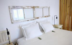 Postel nebo postele na pokoji v ubytování O Refúgio do Pim