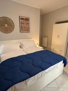 Un pat sau paturi într-o cameră la Sisella Home- Porto by Napolipopart