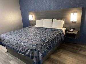 Ένα ή περισσότερα κρεβάτια σε δωμάτιο στο The Wayne Inn