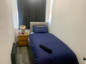 Llit o llits en una habitació de Wheeleys Suite
